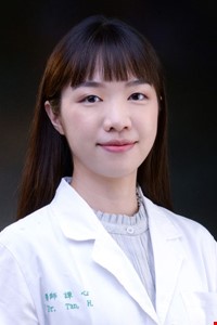 譚心